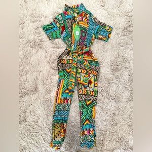 Super cute Farm Rio jump suit never worn with tag attached!